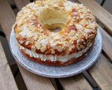 A picture of step 8 of Roscón de Reyes 2025 v2: With Almonds, Sugar, and Whipped Cream Filling.
