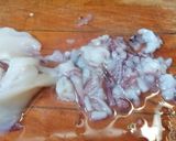 Foto del passaggio 3 della ricetta Calamari ripieni di melanzane su letto di pomodorini
