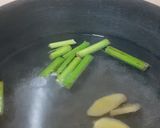A picture of step 1 of Lemongrass Galangal Honey Green Tea (great drink for cold & flu).