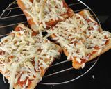 A picture of step 2 of Open bread pizza.