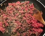 A picture of step 7 of Cheese and Spinach stuffed Cannelloni with a meat ragù.