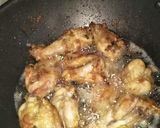 A picture of step 2 of Garlic chicken wings with chineese rice.