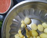 A picture of step 1 of Kashmiri dum aloo.