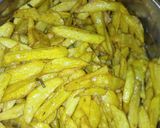 A picture of step 3 of French-Celery fries with fried eggs.