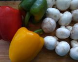 A picture of step 1 of Lemon Chicken with Colorful Peppers and Mushrooms.