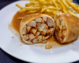 Foto del paso 16 de la receta: Calamares rellenos de mariscos