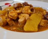Foto del paso 7 de la receta Guiso de pulpo con langostinos y patatas