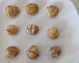 A picture of step 1 of Bacon wrapped chestnuts.