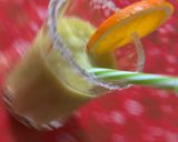 A picture of step 3 of Orange, Kiwi, and Unsweetened Almond Milk Smoothie.