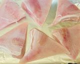 A picture of step 3 of Stingray wings in sesame seeds in the oven.