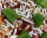 A picture of step 3 of Chicken Franks pizza 🍮🍕🍕🍕.