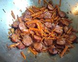 A picture of step 1 of Sautéed cabbage and carrot with sausage.