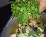 A picture of step 4 of Spinach Brinjal Potato Sabji.