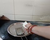 A picture of step 1 of Pepper Ghanto (Grated Green Papaya with Potato).
