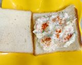 A picture of step 2 of Bread vegetable Sandwich for kids.