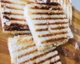 A picture of step 3 of Cheesy chilli finger sandwich.