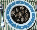 Foto del paso 10 de la receta: Chipirones en su tinta rellenos de langostinos