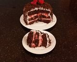 A picture of step 31 of Chocolate Layer Cake with Strawberry Cream Filling, White Chocolate Ganache Frosting coated with a Chocolate Crumble.