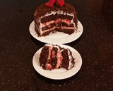 A picture of step 31 of Chocolate Layer Cake with Strawberry Cream Filling, White Chocolate Ganache Frosting coated with a Chocolate Crumble.
