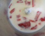 A picture of step 2 of Fresh Strawberry milk shake.