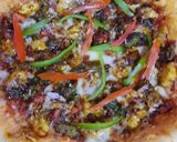 A picture of step 7 of Chicken tandoori pizza.