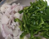 A picture of step 2 of Tava Pulao.