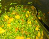 A picture of step 2 of Aloo mungra.