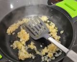 Foto del paso 2 de la receta: Tellinas, con cebolla caramelizada y sake