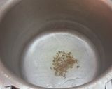 A picture of step 1 of CINNAMON SPICED, DRY FRUIT PULAO.