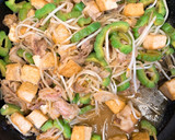 A picture of step 7 of Tofu, Bitter melon, Pork and Egg Stir fry.