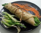 A picture of step 10 of Smokey roll paratha.
