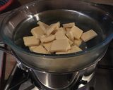 A picture of step 1 of Simple White Chocolate Cheesecake with Raspberry Sauce.