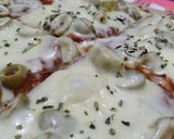 Foto del paso 5 de la receta: Pizza con muzzarela y aceitunas 🍕😋
