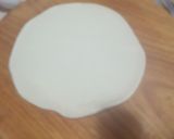 A picture of step 5 of Phulko Luchi/ Luchi in Bengali style.