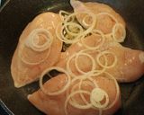 A picture of step 3 of Pan Seared Chicken Breast smothered in a Crimini Mushroom Sauce.