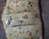 A picture of step 7 of Domino's style stuffed cheese garlic bread.