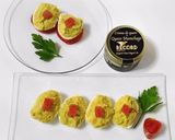 A picture of step 5 of Deviled Eggs with Manchego Cheese Spread and Avocado.