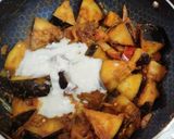 A picture of step 5 of Curd brinjal gravy.