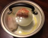 A picture of step 2 of California Farm Stuffed Baked Onions.