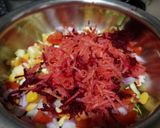 A picture of step 3 of Mix fruit and veg salad.