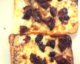 A picture of step 3 of My New style Of Cheese on toast with Sun dried Tomatoes. 😁.