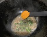 A picture of step 2 of Tadka idli.