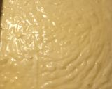 A picture of step 2 of Nutella, Strawberry Jam Oven Pancake.