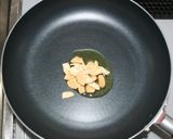 A picture of step 14 of Aiba’s Mapo Edamame with Dried Edamame and Dried Shimeji Mushrooms.