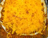 A picture of step 8 of Meatless Enchilada Pie.
