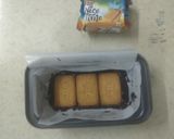 A picture of step 7 of Chocolate Biscuit Cake with Sugar coated Coconut Biscuits.