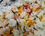 A picture of step 2 of Gobhi Matar Masala.