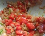 A picture of step 1 of Bread upma.