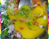 A picture of step 3 of Spicy Egg With Roti.