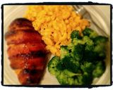A picture of step 6 of Sticky Mustard Glazed Bacon wrapped Chicken.